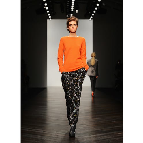 Sleeve, Joint, Standing, Style, Fashion show, Street fashion, Waist, Orange, Fashion, Neck, 