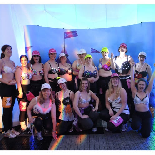 Social group, Pink, Thigh, Abdomen, Waist, Costume, Costume accessory, Stomach, Makeover, Tattoo, 