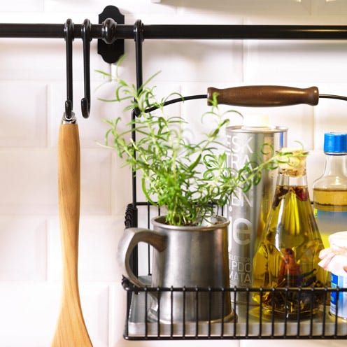 Wood, Bottle, Glass bottle, Iron, Hardwood, Drinkware, Metal, Interior design, Oil, Vase, 