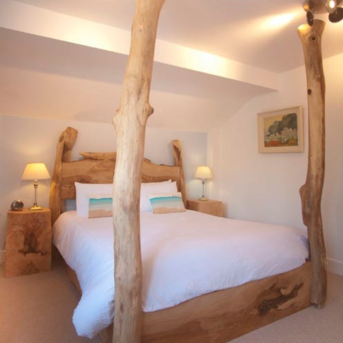 Wood, Bed, Lighting, Room, Interior design, Bedding, Property, Hardwood, Wall, Bedroom, 