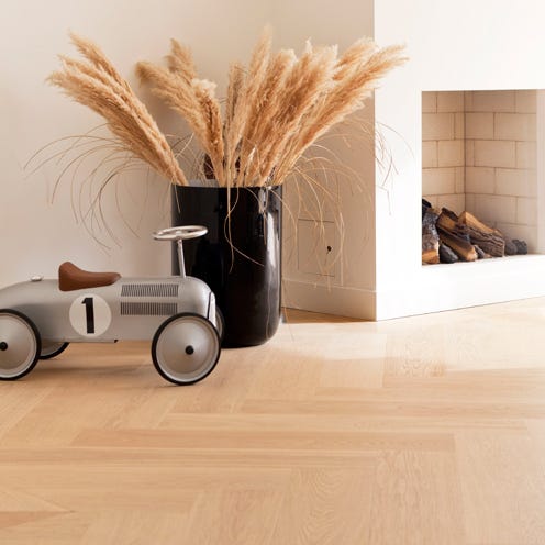 Wood, Toy, Beige, Toy vehicle, Baby toys, Wood flooring, Still life photography, Laminate flooring, Rolling, Wood stain, 