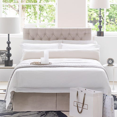 Room, Interior design, Property, Textile, Wall, Bedding, Floor, Linens, Couch, Bed sheet, 
