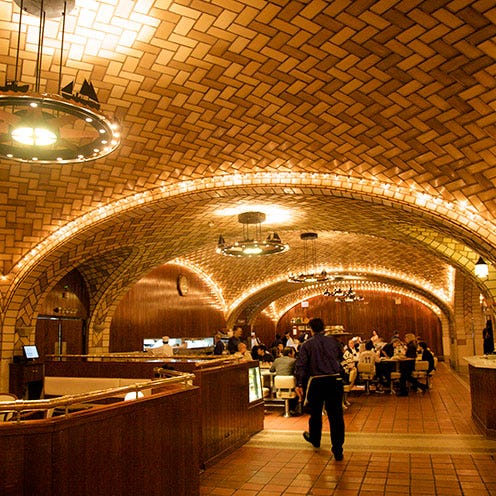 Lighting, Ceiling, Light fixture, Amber, Hall, Interior design, Arch, Lobby, Ceiling fixture, Electricity, 