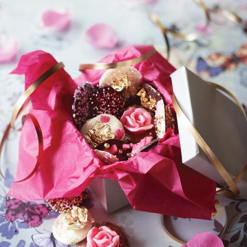Petal, Red, Pink, Party supply, Sweetness, Dessert, Cut flowers, Artificial flower, Ribbon, Toy, 
