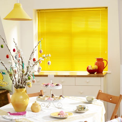 Yellow, Tablecloth, Interior design, Room, Serveware, Dishware, Interior design, Furniture, Wall, Orange, 