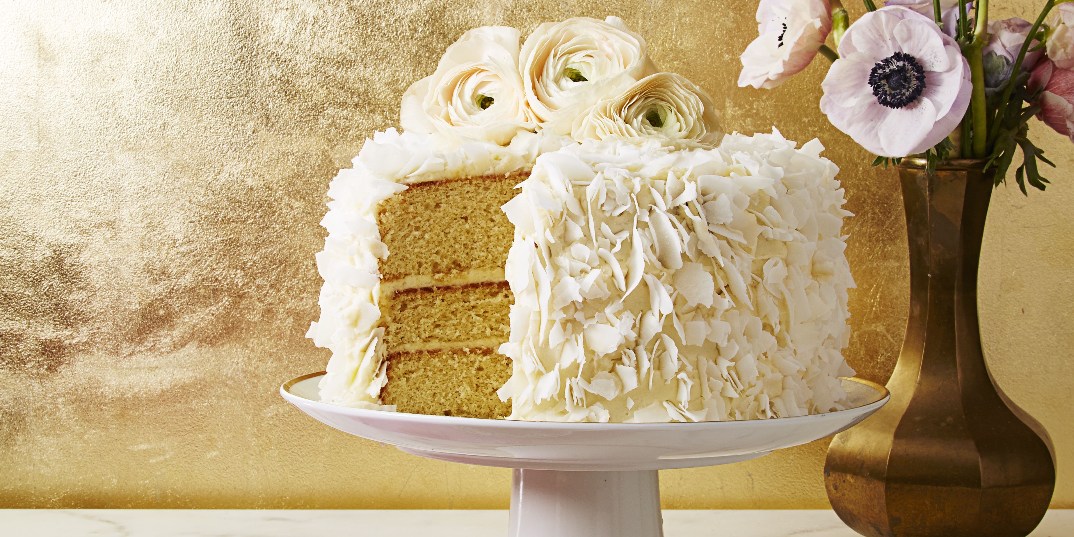 Coconut Cake with Coconut Buttercream Icing | Just A Pinch Recipes