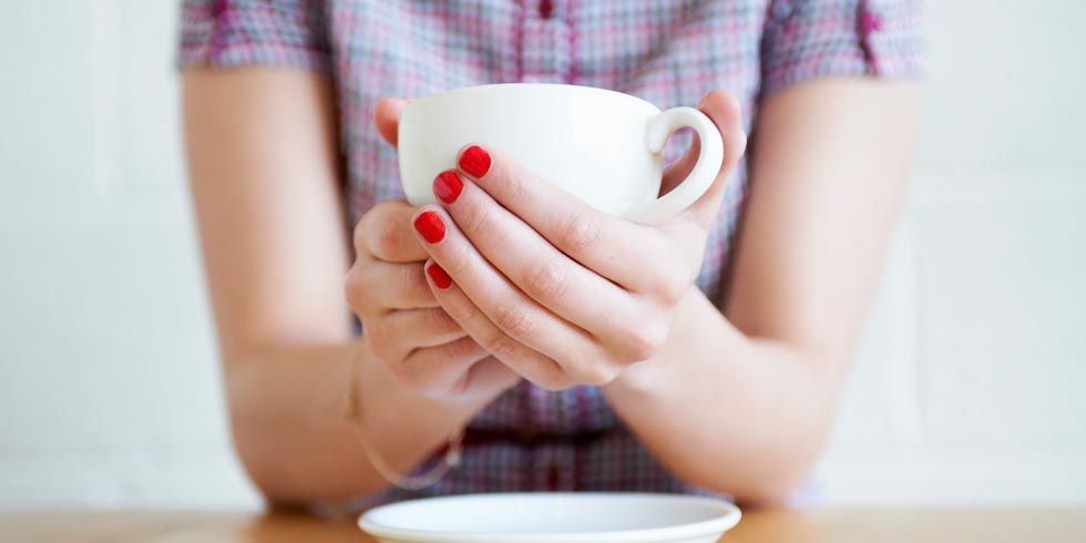 You're holding that mug wrong -- physicist calculates 'claw-hand posture'  is most effective to avoid coffee spills