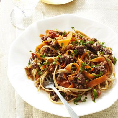 Fusilli pasta with rabbit ragù on carrot mousse