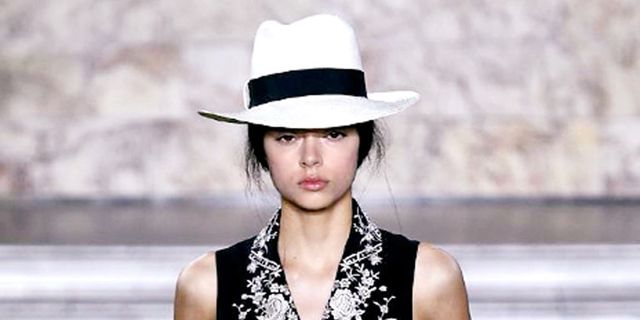 Hat, Shoulder, Style, Fashion model, Street fashion, Costume accessory, Headgear, Fashion, Neck, Sleeveless shirt, 