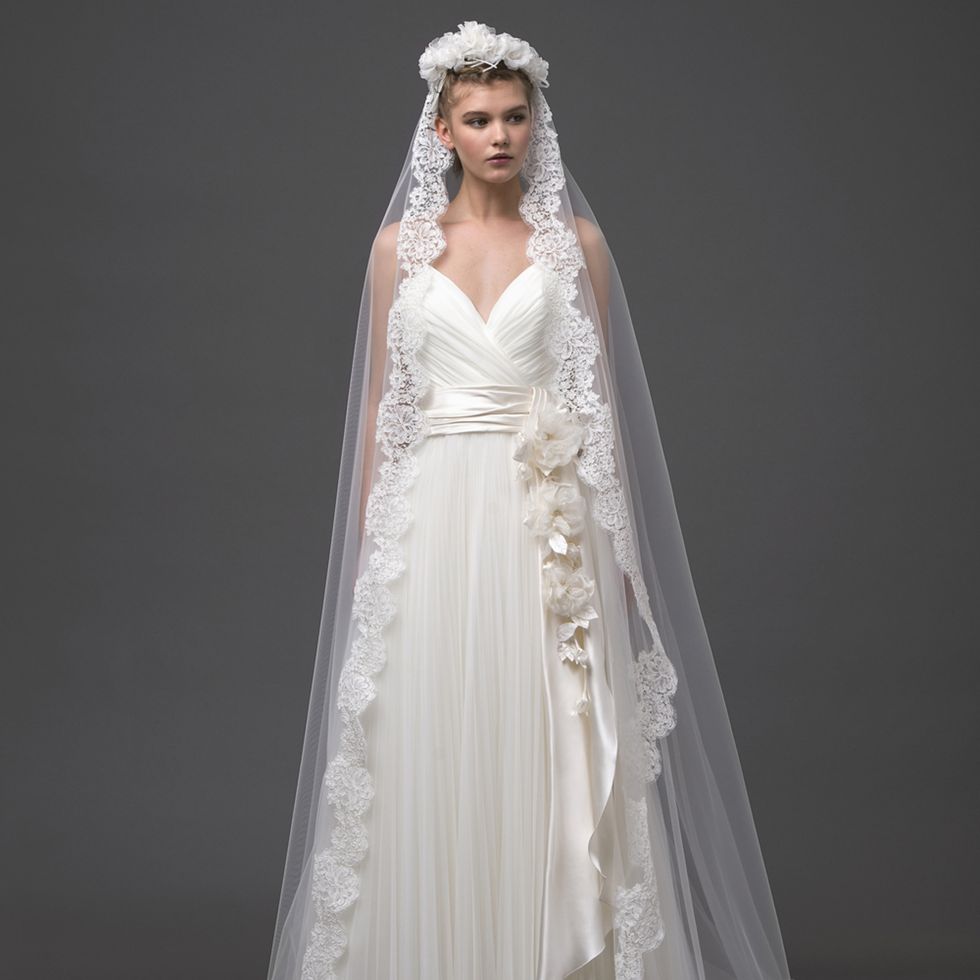 Clothing, Bridal clothing, Dress, Sleeve, Veil, Shoulder, Bridal veil, Textile, Photograph, Wedding dress, 