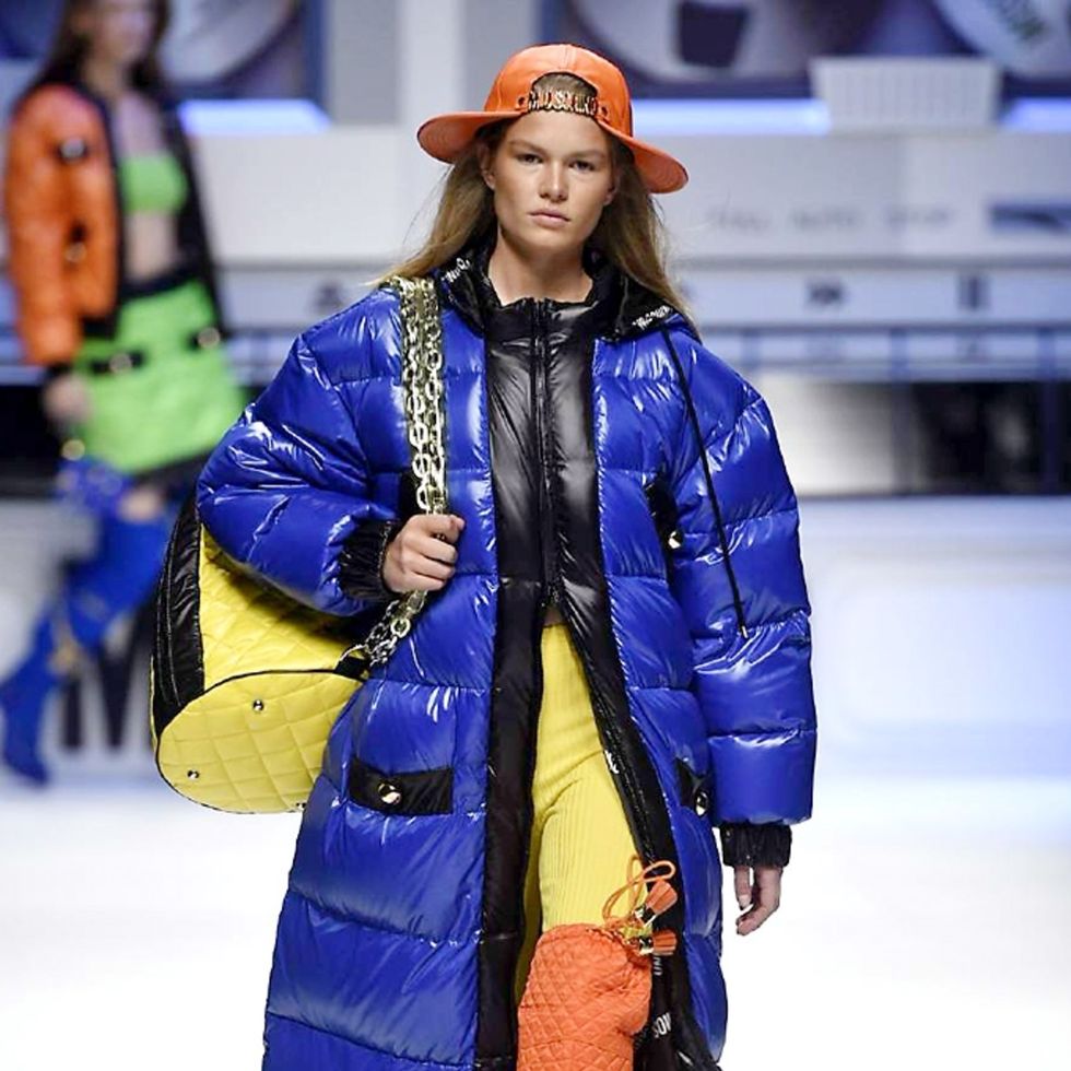 Winter, Blue, Textile, Outerwear, Fashion show, Hat, Electric blue, Fashion model, Street fashion, Glove, 