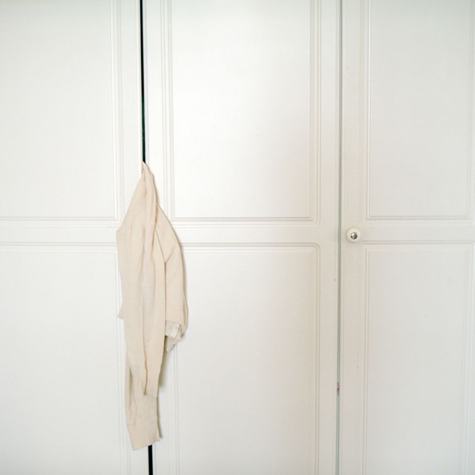 Clothes hanger, Fixture, Grey, Beige, Handle, Home door, Door handle, Sweater, 