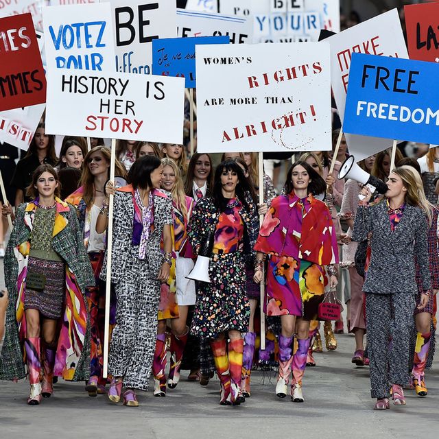 Footwear, People, Street fashion, Fashion, Public event, Protest, Costume, Fashion design, Banner, Poster, 