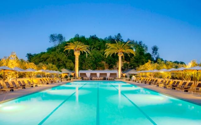Swimming pool, Resort, Real estate, Fluid, Azure, Arecales, Aqua, Majorelle blue, Resort town, Composite material, 