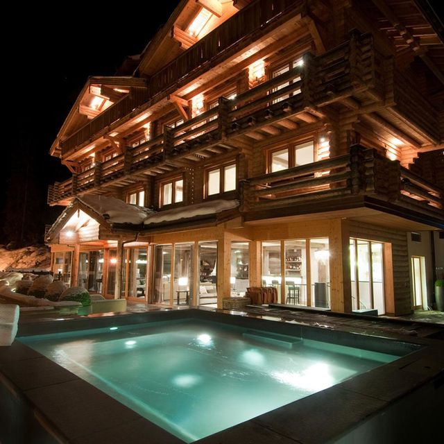 Property, Night, Facade, Swimming pool, Real estate, Building, House, Resort, Home, Villa, 