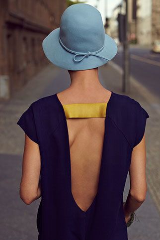 Sleeve, Shoulder, Standing, Joint, Hat, Headgear, Electric blue, Street fashion, Neck, Back, 