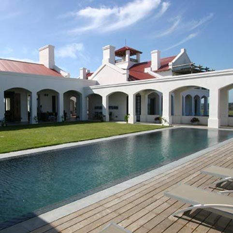 Swimming pool, Property, Real estate, House, Residential area, Home, Villa, Tile, Roof, Composite material, 