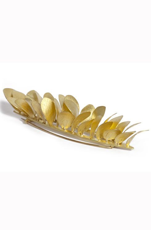 Yellow, Amber, Natural material, Metal, Oval, Staple food, 