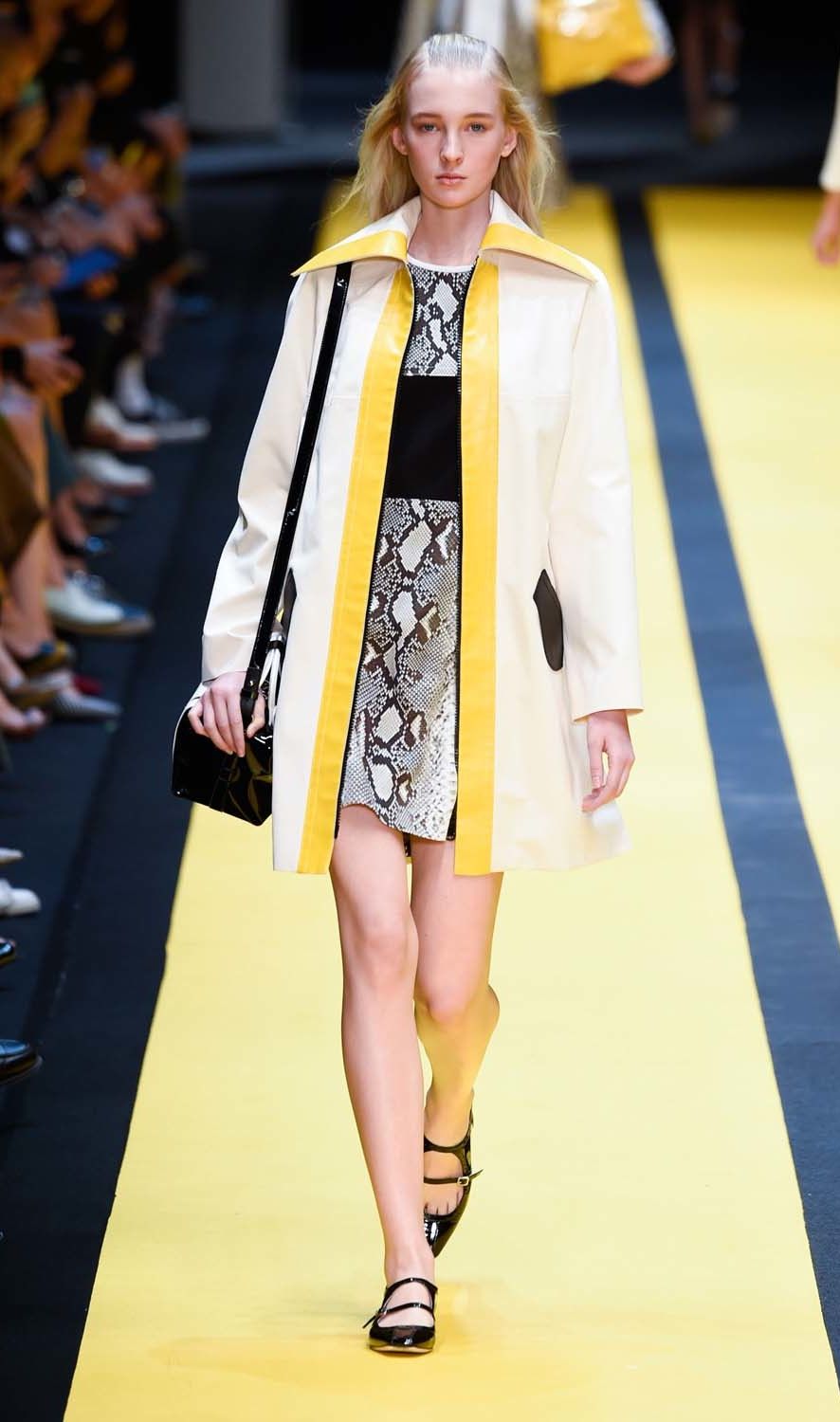Fashion show, Yellow, Shoulder, Runway, Joint, Outerwear, Fashion model, Style, Dress, Flooring, 