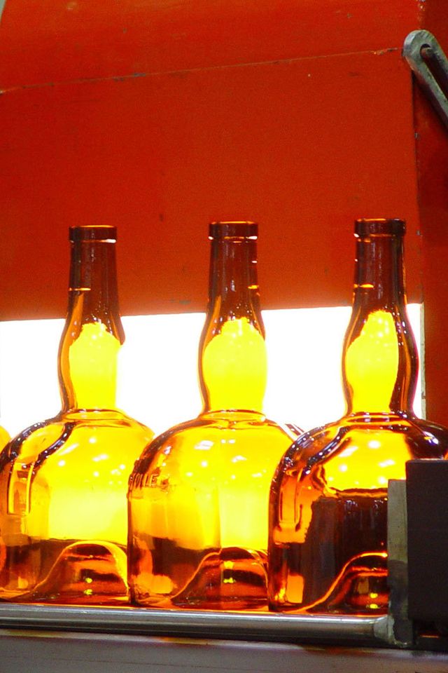 Yellow, Bottle, Glass bottle, Liquid, Glass, Orange, Fluid, Amber, Still life photography, Alcohol, 