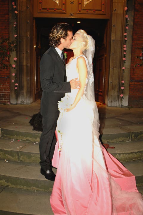 Gown, Wedding dress, Photograph, Dress, Bridal clothing, Bride, Formal wear, Bridal accessory, Pink, Ceremony,