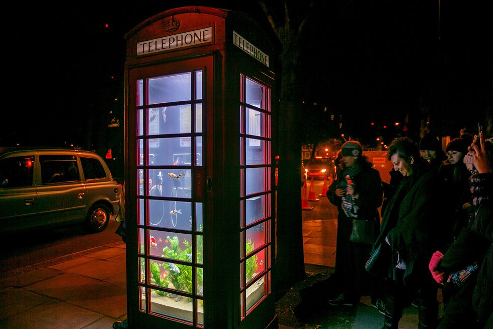 Telephone booth, Public space, Night, City, Communication Device, Midnight, Darkness, Payphone, Sport utility vehicle, Telephony, 