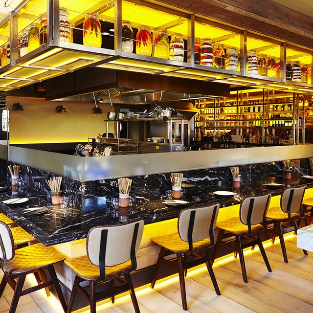 Yellow, Furniture, Restaurant, Amber, Chair, Cafeteria, Fast food restaurant, Food court, Drinking establishment, Kitchen & dining room table, 
