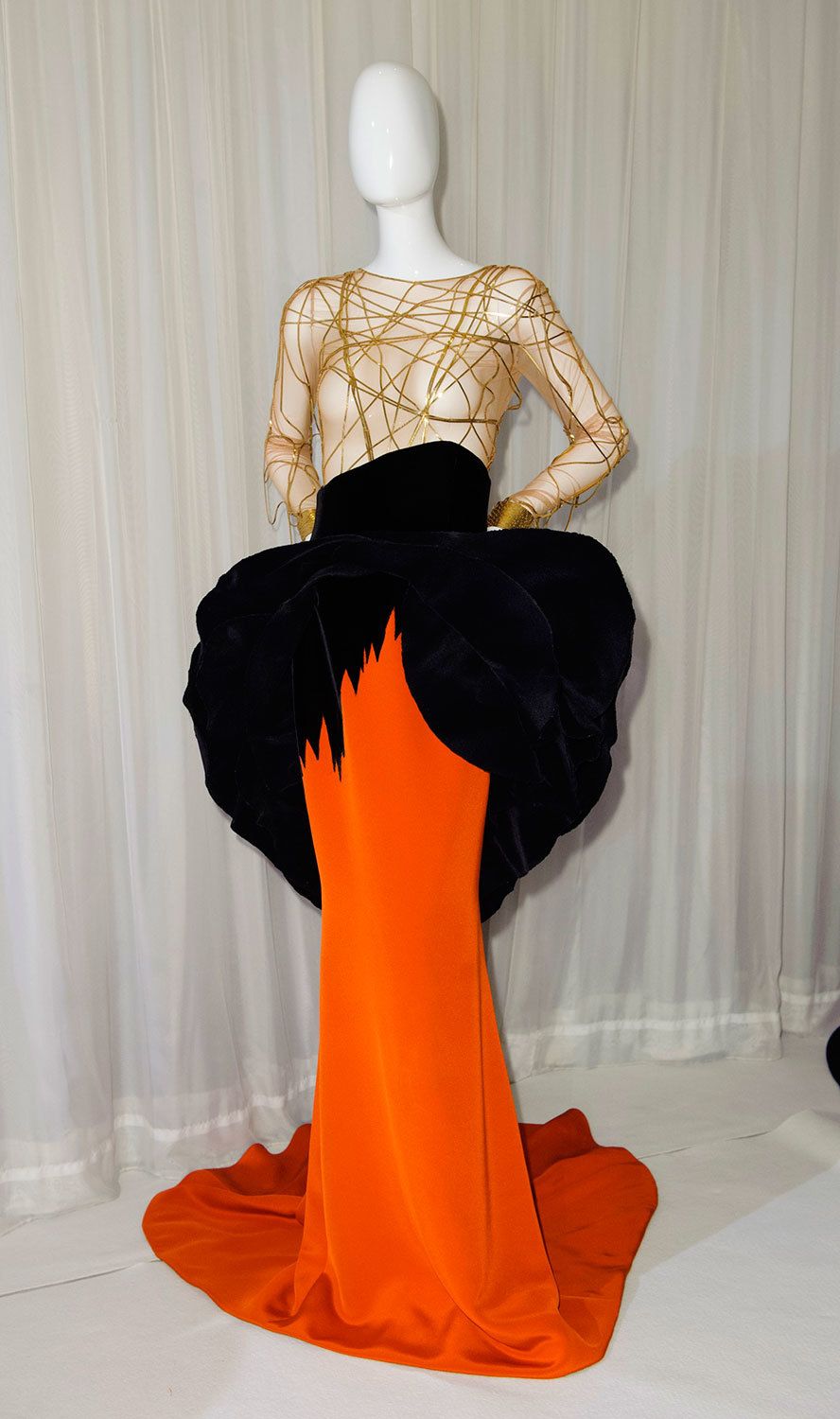 Shoulder, Joint, Mannequin, Style, Waist, Orange, One-piece garment, Fashion, Neck, Dress, 