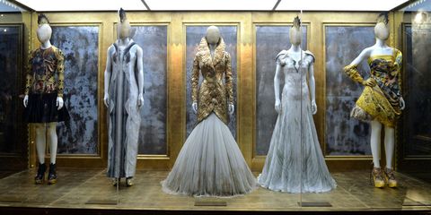 Dress, Retail, Mannequin, Costume design, Fashion, One-piece garment, Display window, Gown, Boutique, Display case, 