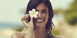 Lip, Hairstyle, Skin, Brassiere, Petal, Happy, People in nature, Summer, Facial expression, Beauty, 
