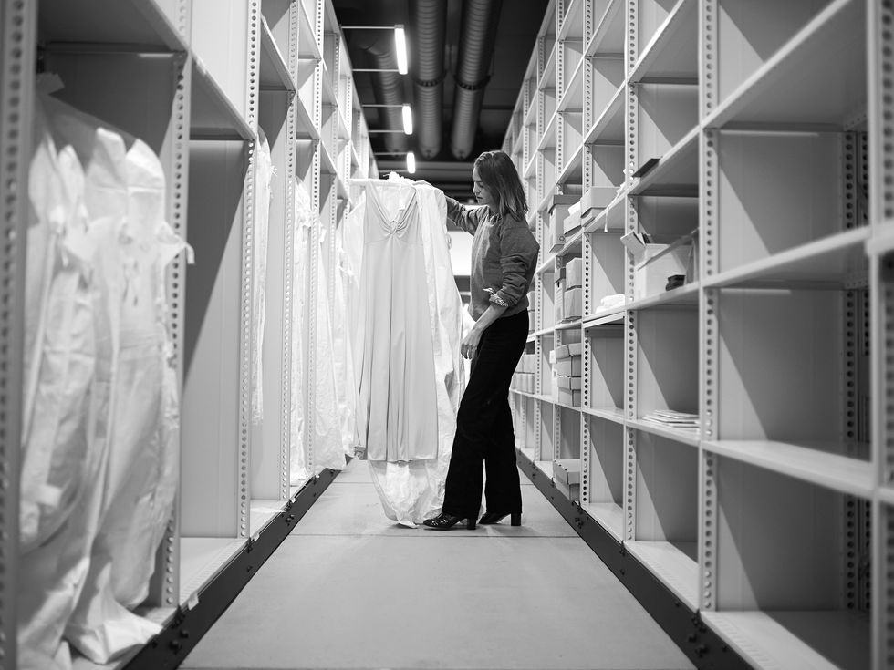 Alexa Chung looking through Marks & Spencer's archive