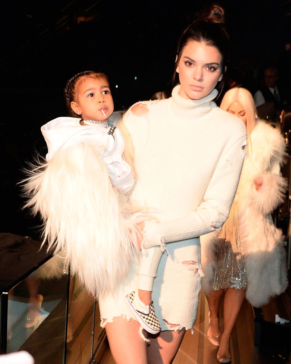 North West with Kendall Jenner at Yeezy season 3