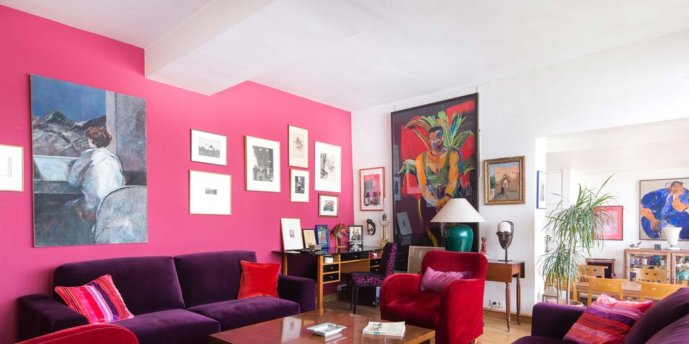 Room, Interior design, Living room, Table, Furniture, Couch, Interior design, Coffee table, Purple, Picture frame, 