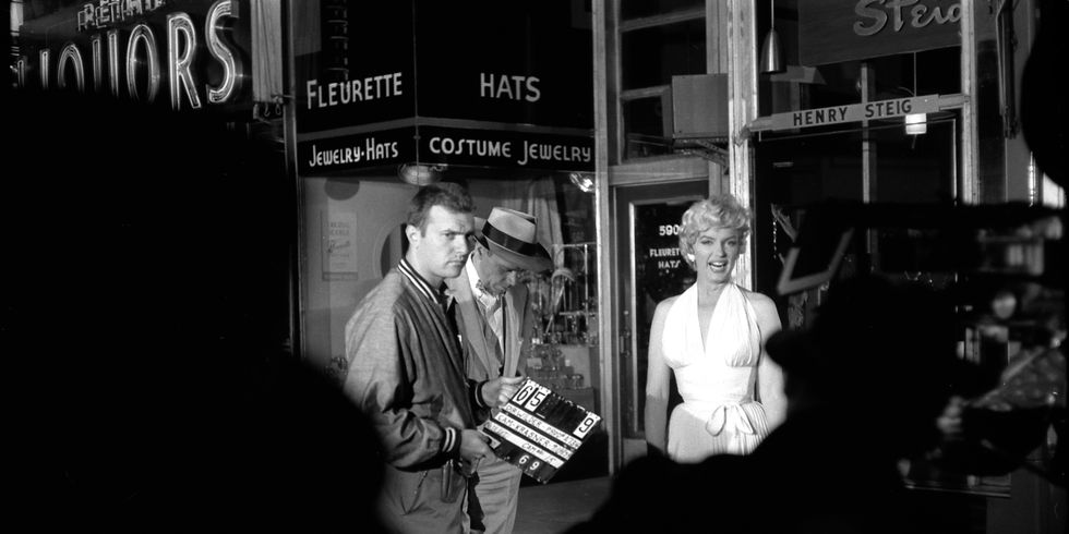 <p>With Tom Ewell on the set of <em>The Seven Year Itch</em> in 1954</p>