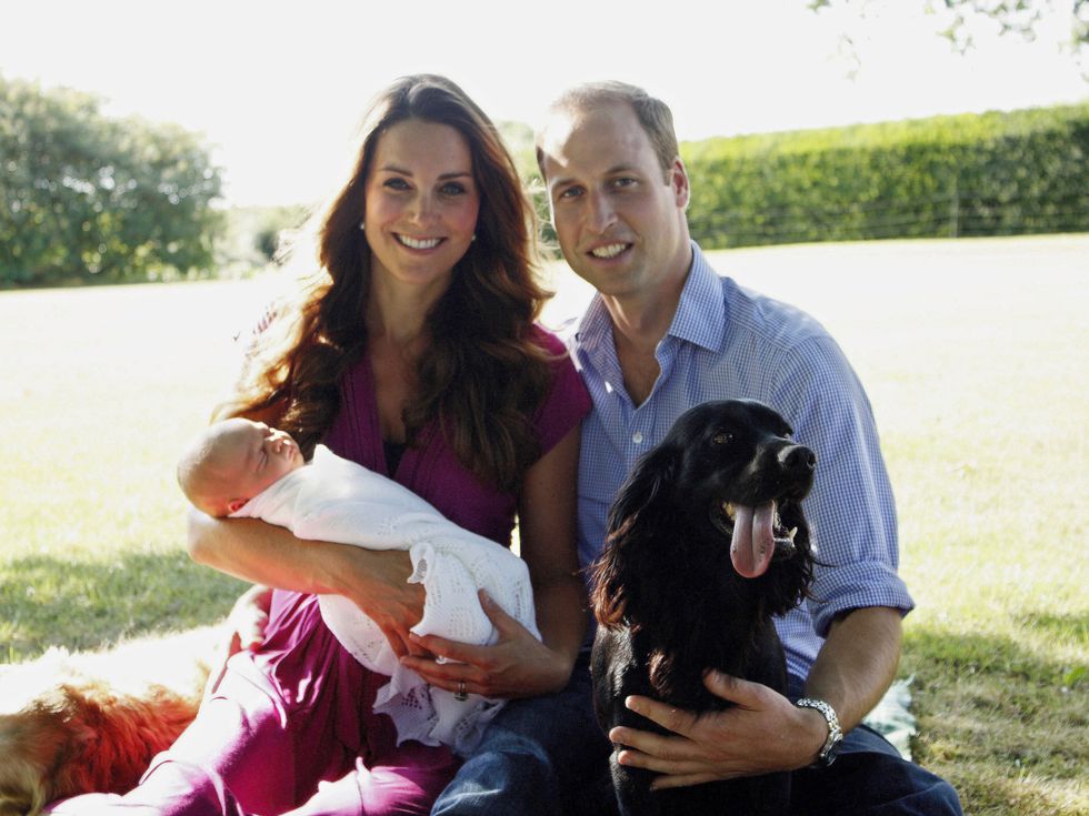 The Duke and Duchess of Cambridge with Prince George and their dog, Lupo