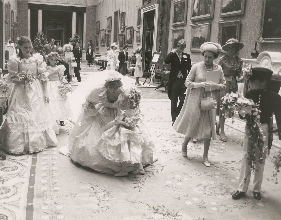 Dress, Photograph, Petal, Bridal clothing, Hat, Gown, Suit, Wedding dress, Monochrome, Tradition, 