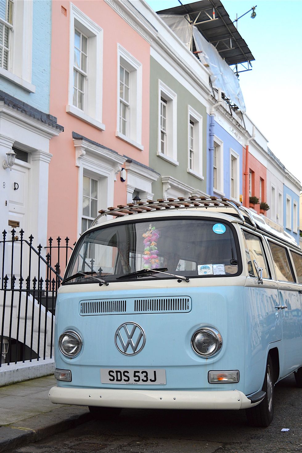 <p>Wandering around Notting Hill is the perfect place to spot rows of pastel houses–and the pretty pastel vintage cars parked outside of them.</p>