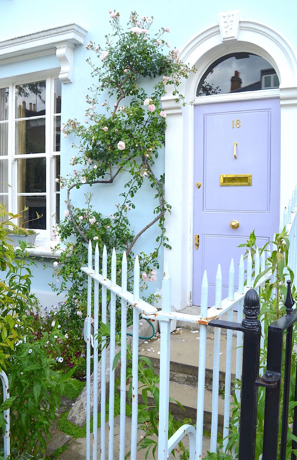 <p>Running through Hammersmith and Fulham, Wingate Road is one of the sweetest streets, packed with pastel homes, quaint gardens and amazing entrances–like this one.</p>