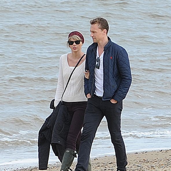 <p>After news of their relationship broke, Hiddleswift <a href="http://www.marieclaire.com/celebrity/news/a21501/taylor-swift-tom-hiddleston-world-travels/">jetted off to England</a> for a walk on the beach with Tom's mom, Diana. And while they might look <em>slightly</em> tense to the untrained eye, go ahead and check out Taylor's left hand because it's telling a different story. "Her hand is relatively relaxed in his arms, and there have been other photos when she has it tight," Cobb says. "This is just a comfortable, leisurely stroll."</p>