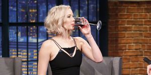 Jennifer Lawrence drinking red wine
