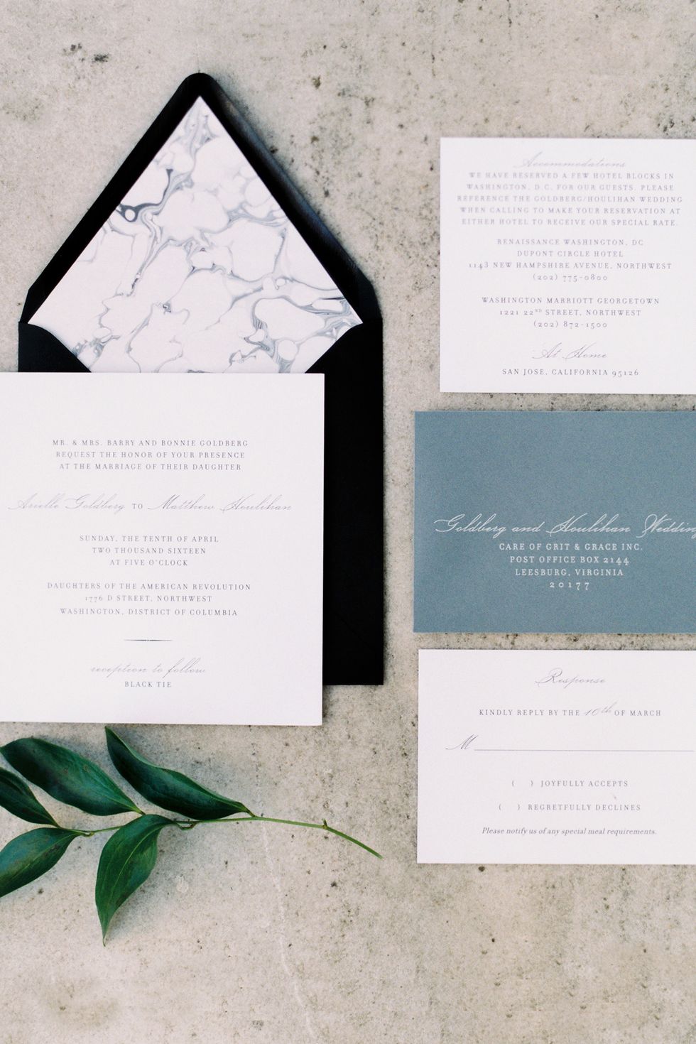 <p>"We wanted something very simple and classic, and we both have really been into marble <em>everything</em> lately, so we decided to get a custom marbled liner for each invitation," explained Arielle. Keeping to their color palette of black and white, the couple worked with <a href="http://www.paperzest.com/" target="_blank" tabindex="-1">Paperzest</a> to create their stationery suite.</p>