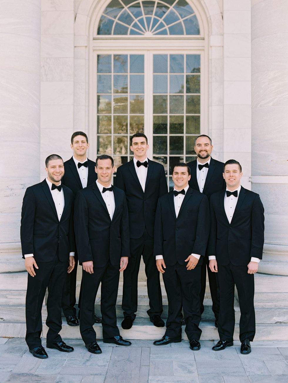 <p>Matt's groomsmen, including his brother, Arielle's two brothers, and his three best friends, looked sharp in their tuxedos from <a href="https://tuxedo.menswearhouse.com/verawang.do" target="_blank" tabindex="-1">Vera Wang</a>.</p>