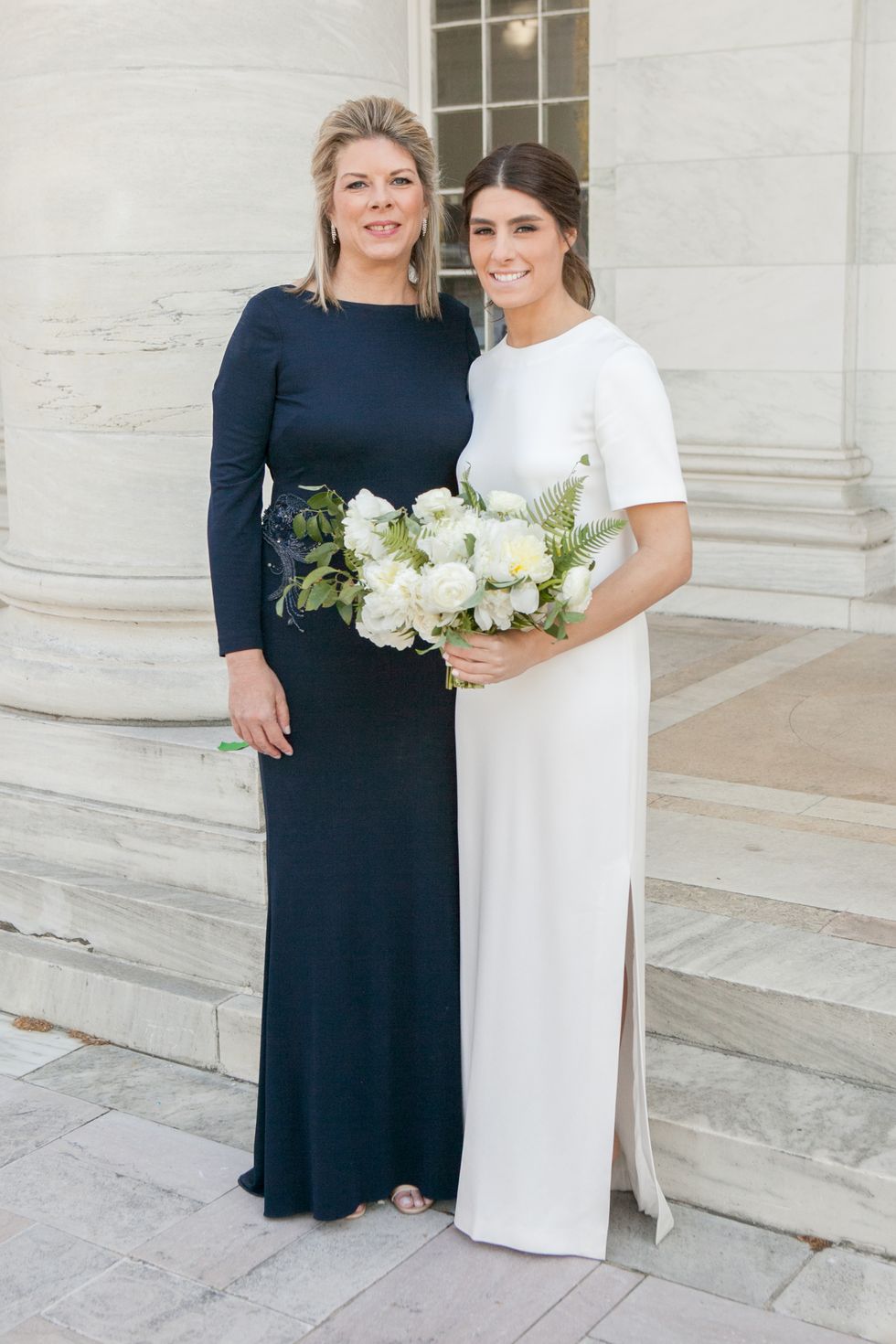 <p>Arielle and her mother, dressed in <a href="http://www.badgleymischka.com/" target="_blank" tabindex="-1">Badgley Mischka</a>, took photos at DAR. "My mom has always been my biggest supporter," said the bride. "Throughout the months leading up to the wedding, she kept assuring me that I needed to choose what I liked and not to worry about what anyone else thought. Even though that was really difficult for me, I think it's probably something that everyone goes through and it was advice I stuck to."</p>