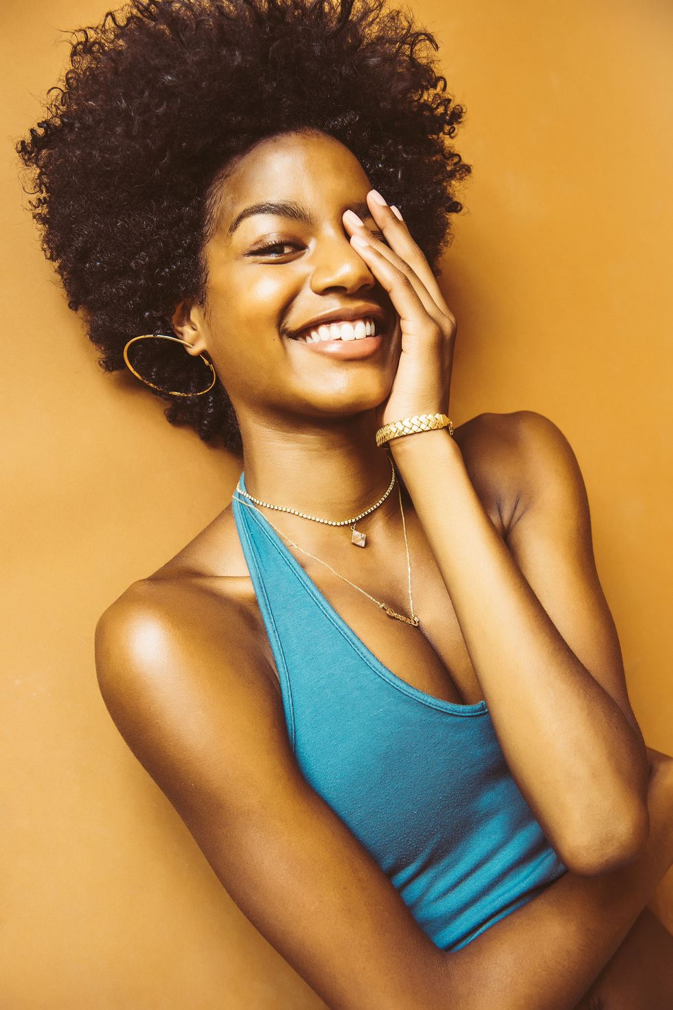 Lip, Mouth, Jheri curl, Hairstyle, Shoulder, Afro, Jewellery, Black hair, Style, Chest, 