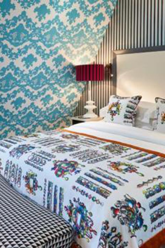 Bed, Blue, Interior design, Room, Bedding, Property, Bedroom, Textile, Bed sheet, Wall, 