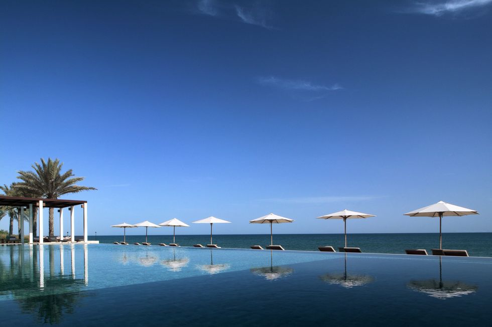 Body of water, Sky, Water, Ocean, Reflection, Azure, Arecales, Beach, Resort, Calm, 