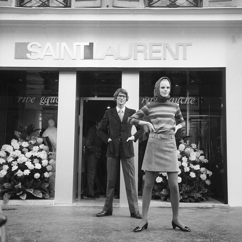 Yves Saint Laurent outside his Rive Gauche boutique in 1966. Picture: Getty Images
