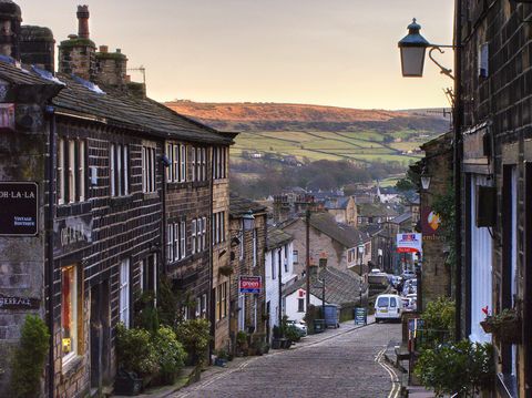 <p>
Home to the Bronte sisters and no doubt a heavy influence in English literature, Haworth in North Yorkshire is a charming village amongst the rolling Yorkshire moors. A long, steep cobbled street lined with old-fashioned curiosity shop types makes for picture-perfect winter scenes.</p>