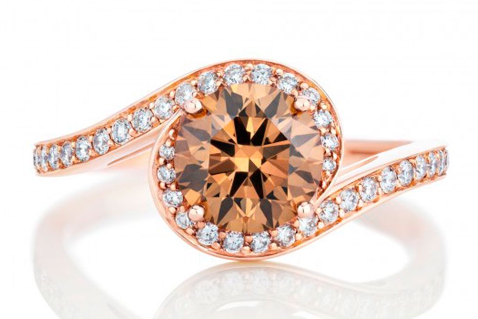 Ring, Engagement ring, Jewellery, Diamond, Pre-engagement ring, Fashion accessory, Gemstone, Orange, Yellow, Wedding ring, 