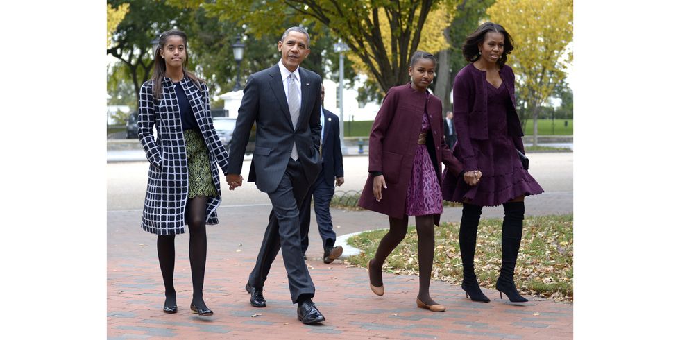 WASHINGTON, DC - OCTOBER 27:  U.S. President Barack Obama walks with his wife Michelle Obama (R) and two daughters Malia Obama (L) and Sasha Obama (2R) through Lafayette Park to St John's Church to attend service October 27, 2013 in Washington, DC. Obama is scheduled to travel to Boston this week.  (Photo by Shawn Thew-Pool/Getty Images)